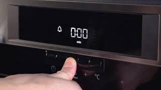 How To Set Your Oven Timer  AEG [upl. by Amoihc130]