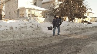 Shoveling tip to stop snow from blocking driveway [upl. by Burget]