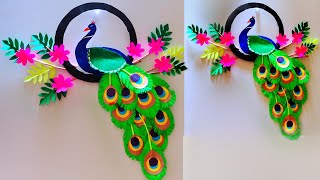 how to make beautiful wall decoration peacock craft with paper  art and craft  peacock craft [upl. by Outhe]