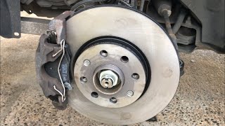 How To Change front brake pads and discs on a Vauxhall Corsa E [upl. by Leasa]